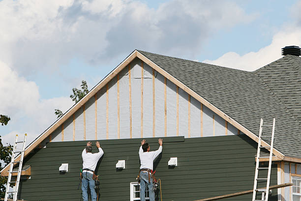 Professional Siding Contractor technician working in Ridgeway, OH